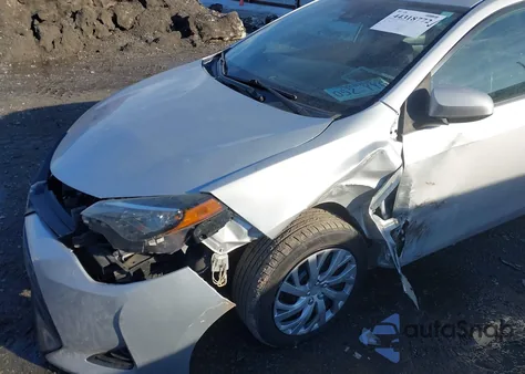 2019 Toyota Corolla Le z USA, uszkodzony, nr VIN 2T1BURHE0KC147123